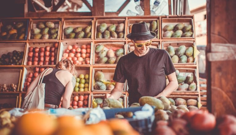 people buying vegetables